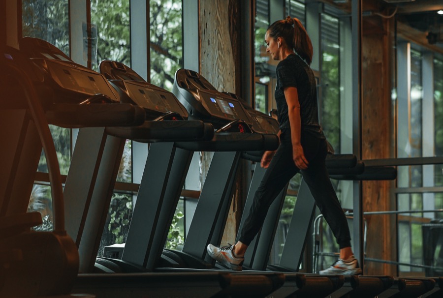 women walking treadmill